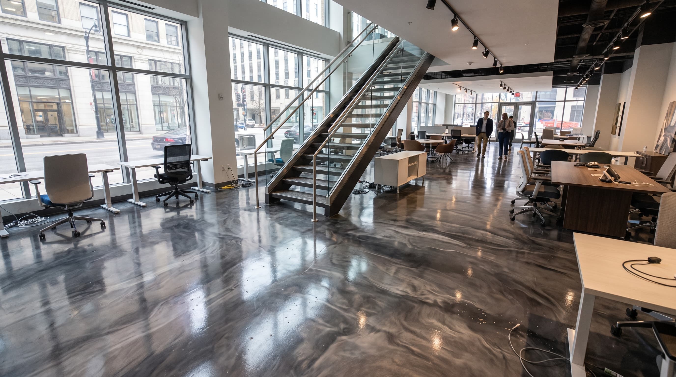 Office showroom with a charcoal and silver metallic epoxy floor